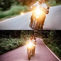A dynamic shot of a couple enjoying a ride on a motorcycle down a tree-lined road. The motion blur and bright headlight create a sense of adventure and freedom.