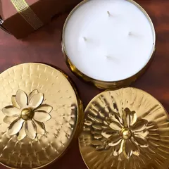 Our 4-inch premium golden urli with a flower lid is a bestseller for Diwali. It's a beautiful decor piece that also makes for a very elegant gift.