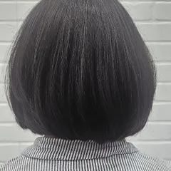 The back view of a perfectly executed classic bob. The clean lines and precise shape create a timeless and sophisticated look.