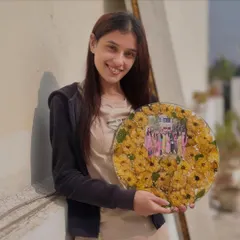 Yellow roses and love from all your friends will now be with you forever. Here I am, holding a finished frame preserving a special photo with friends.