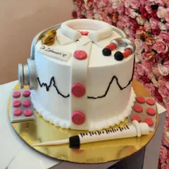 A full view of the doctor-themed cake, a perfect way to celebrate a medical professional's achievement or birthday.