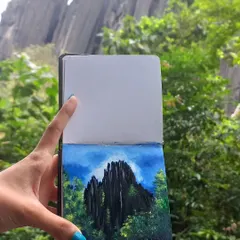 Here is my finished acrylic painting of the Yana rock formations, held up against the actual landscape that inspired it. For me, art is about connecting with a place, and this piece, created from a live sketch, is a direct memory of my journey through Uttara Kannada.