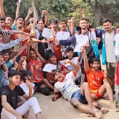 This is the moment we live for. The pure joy of victory after months of hard work and dedication. Our junior team celebrating their win, holding their trophies high. This is what our training is all about.
