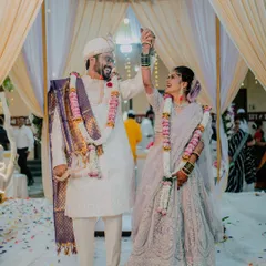 A moment of pure celebration as the bride and groom exchange garlands during the Varmala ceremony. I capture the energy and joy of this key Maharashtrian wedding ritual.