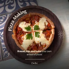 A freshly baked artisanal pizza, made by a participant in our Delhi workshop. You get to knead the dough, choose your toppings, and bake it to perfection.