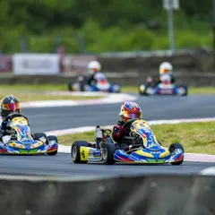 Two of our micro drivers battling it out on track. We teach our racers to compete hard but fair, pushing each other to become better and faster.