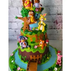 We poured so much love into crafting every detail of this Winnie the Pooh cake. From Pooh and his friends in the Hundred Acre Wood to the tiny bridge, each element is handmade to bring your favorite stories to life.