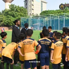 A team huddle led by our coaches at our Chanakyapuri training ground. These huddles are for tactical instructions, motivation, and reinforcing the importance of playing as a team.