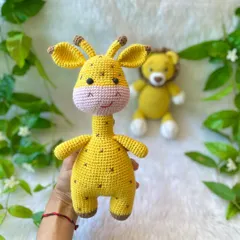 Holding the big, cheerful giraffe from the jungle friends set. I love his sweet smile and spotted pattern.