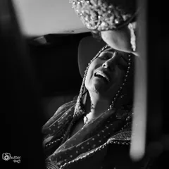 A mother's tears during the Bidai ceremony. We capture these poignant, emotional moments with the utmost respect and sensitivity, preserving them forever.