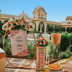 A close-up of the beautiful welcome sign and floral decor at a destination mehendi. These details create the atmosphere and we make sure to capture them.