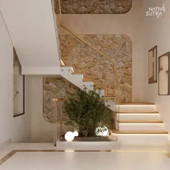 A staircase can be more than a transition; it can be the heart of the home. For this project, we designed a floating staircase against a backdrop of rough-cut stone, with an integrated planter that brings life and nature indoors. The under-step lighting adds a layer of warmth and drama.