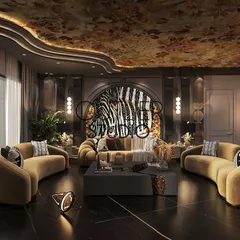 A luxurious lounge area designed for connection. Curved mustard sofas are arranged for conversation, set against a backdrop of a dramatic zebra-print feature wall and a beautifully painted ceiling.