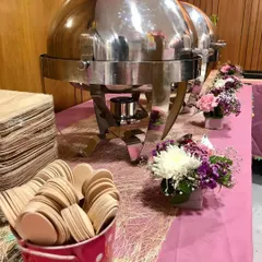 A simple yet elegant buffet setup for a Women's Day celebration. I used eco-friendly wooden cutlery and plates, and the table was adorned with fresh flowers.
