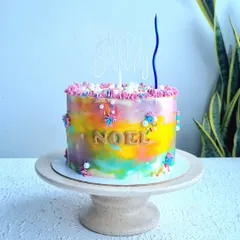 A watercolor-style buttercream cake. I show you how to blend different colors smoothly on the side of the cake to create this beautiful, soft-focus effect.