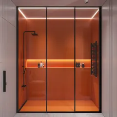 A 3D visualization of a modern bathroom concept featuring a bold, orange back-painted glass shower enclosure. The design uses integrated LED strip lighting to create a dramatic, ambient glow and highlight the clean lines.