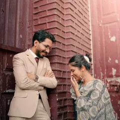 It's the unposed, in-between moments that I love to capture the most. Aditya’s smile and Rattan’s shy laugh here are completely genuine. This is the essence of my vintage-style shoots, focusing on real emotions against the classic backdrop of old Mumbai.