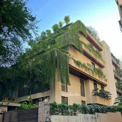 For this family home in Bandra, we created a living facade where greenery spills over each level. This approach to balcony greening turns the building into a vertical garden, offering residents a private natural oasis while softening the building's presence in the neighborhood.