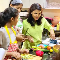 The joy of cooking is in the process. I guide my students through each step, explaining the 'why' behind every ingredient and technique to build their confidence in the kitchen.