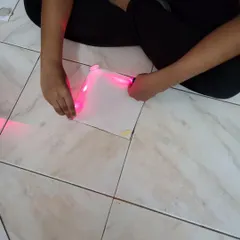 Exploring the properties of light with a simple laser and paper. This experiment teaches about reflection and how light travels in straight lines.