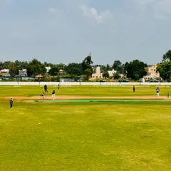 A wide-angle view of our expansive green outfield during the RSCA League Season 6. The quality of our turf ensures a fast outfield and a true playing surface for competitive cricket.