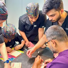 Hands-on training is invaluable. Here, we are practicing suturing techniques on simulation pads. This kind of rigorous practice is what builds the precision needed for excellent surgical outcomes in dermatosurgery.