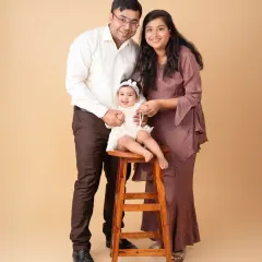 A classic family portrait. We help pose families to look natural and connected, creating a timeless image.