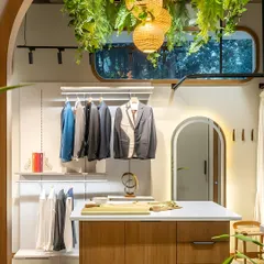 A space designed with intention. Every detail in our studio is curated to inspire, from the hanging greenery to the comfortable seating. It's a place where your journey to elegance unfolds with grace.