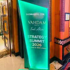 Branded signage is key for reinforcing the event's identity. This custom-fabricated, backlit sign clearly displayed the Vahdam Strategy Summit's theme and branding, serving as both a directional marker and a photo opportunity.