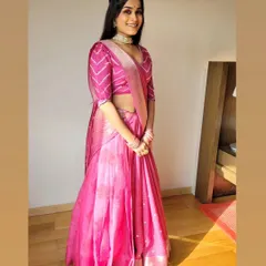 Another look at Reeva's saree-lehenga drape, perfect for a red carpet event.
