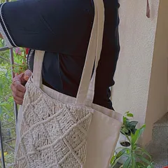Here's one of my upcycled macrame tote bags being used. It's a great, eco-conscious alternative to plastic bags for shopping or carrying your daily items.