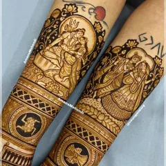 A divine bridal design featuring portraits of Shiv Parvati and Radha Krishna. The intricate details and serene expressions make this a truly special piece for a faith-filled celebration.
