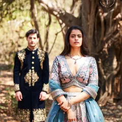 This shot shows how the couple's outfits work together from every angle. It's about creating a cohesive story through style.