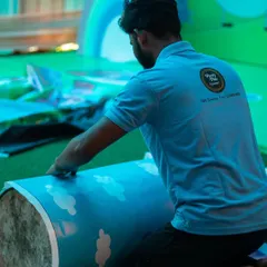 Every detail is carefully crafted. Here, a member of the setup team works on the decorations for a Peppa Pig themed party.