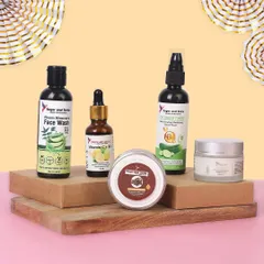 A creative group shot of a skincare line, styled with wooden blocks and props to create a natural, appealing look. This type of lifestyle product photography is perfect for website banners, advertisements, and building a strong brand identity.