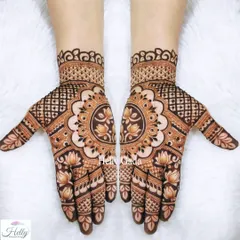 A classic and symmetrical design featuring a large lotus mandala on each palm. The intricate line work and shading give the design depth, while the full-finger coverage adds a traditional touch.