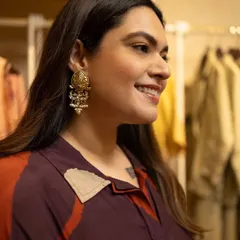 A candid shot of me wearing these gorgeous 'Nandi' danglers from a favorite homegrown jewellery designer. I believe in championing Indian designers, and statement earrings are a signature part of my look.