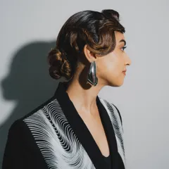 This vintage-inspired slick-back wave is one of my favorite editorial hairstyles. I created this sculpted, high-fashion look for Ridhi Khosla, proving that a classic style can feel incredibly modern and powerful.