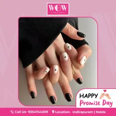A chic and modern design for Promise Day. This look features a classic black and white combination with minimalist heart details for a touch of romance.