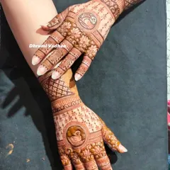 A beautiful design done by my team for a wedding guest. It features a lovely portrait of a monkey and a peacock, showcasing our artistic range.