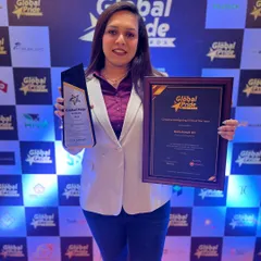 Our Interior Designer, Akshitha P S, proudly displaying the award and certificate presented to our firm. We are honored to be recognized for professional achievement in our field.
