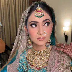 A side profile of the Anand Karaj glam look, showing the beautiful blush and contour that adds dimension to the face.
