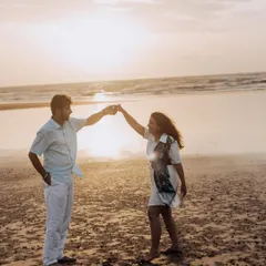 A simple dance on the sand as the sun sets. These unposed, in-between moments often make for the most memorable couple portraits.