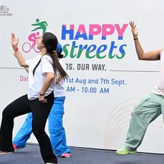The energy on stage was amazing. You can see the joy and enthusiasm as we dance together at the 'Happy Streets' community event.