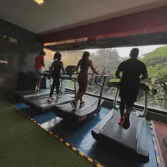 Members of the A3 fam working out on the treadmills, quietly and persistently moving towards their goals.