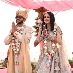 A beautiful moment from the phera ceremony. For this modern bride, I crafted a dewy, fresh makeup look with soft contouring and a natural lip color that enhanced her features beautifully under the open sky.