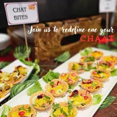Enjoy the authentic taste of chaat with my beautifully arranged chaat bites. This setup for a brand launch features papdi chaat and other tangy treats, complete with all the chutneys and toppings.
