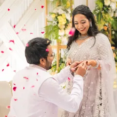 A promise sealed with a ring, under a shower of petals. Rajat and Rachita's proposal was a moment of pure, unscripted romance.