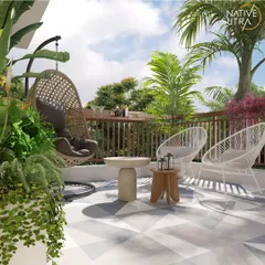 We transformed this urban terrace into a chic oasis for relaxation. The design combines a comfortable rattan swing chair with modern wireframe seating, set against a backdrop of dense palm leaves and a geometric tiled floor, creating a perfect spot for morning coffee or evening drinks.