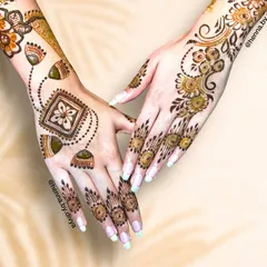 This Indo-Western design combines a geometric centerpiece with hanging jhumkas and a flowing floral vine on the other hand. It's a perfect fusion of modern structure and traditional grace.
